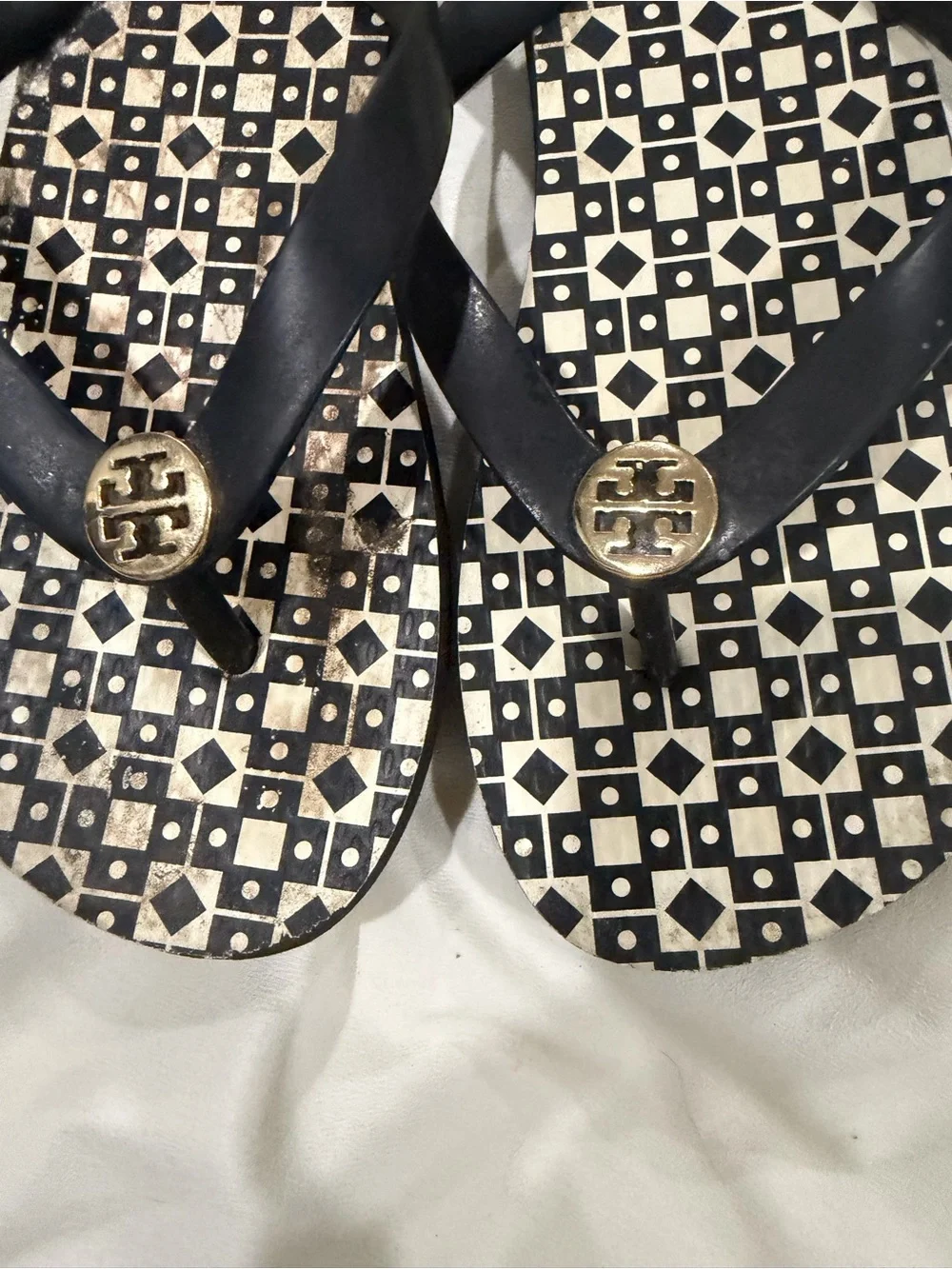 Tory Burch Black Strap Geometric Printed Flip Flops with Gold Medallions